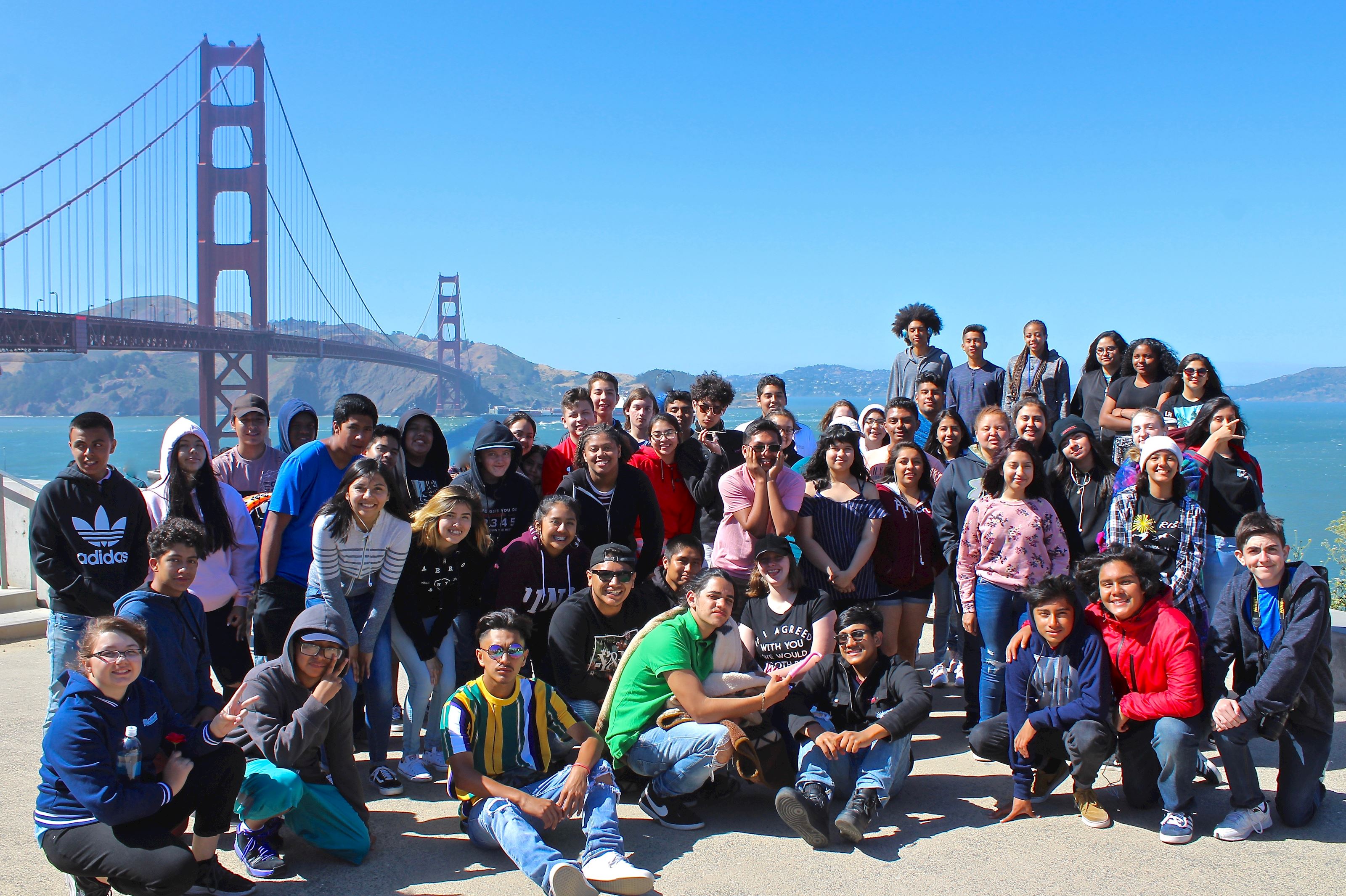 students posting before San Francisco bridge