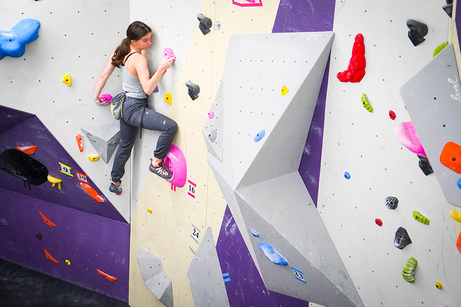girl indoor rock climbing